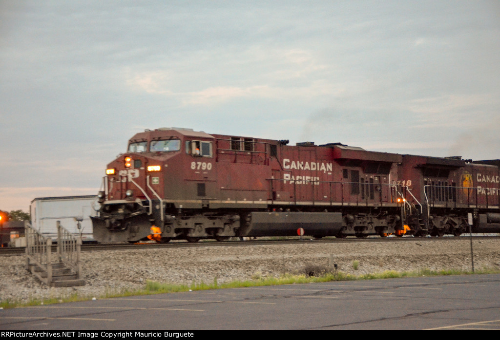 CP ES44AC Locomotive leading a train